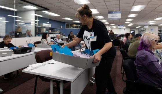 Election officials sort mail-in ballots at the Washoe County Registrar of Voters Office in Reno, Nevada, on Tuesday.