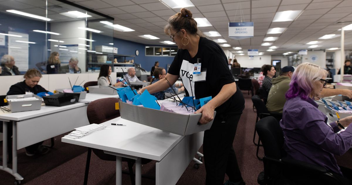 Election officials sort mail-in ballots at the Washoe County Registrar of Voters Office in Reno, Nevada, on Tuesday.
