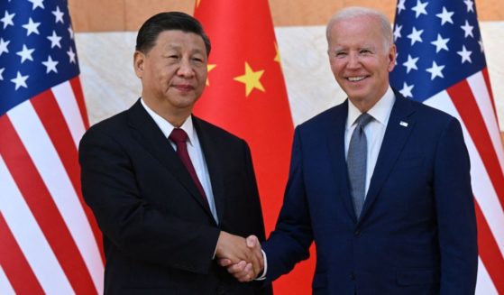 Chinese President Xi Jinping shakes hands with President Joe Biden as they meet on the sidelines of the Group of 20 summit in Nusa Dua on the Indonesian resort island of Bali on Monday.
