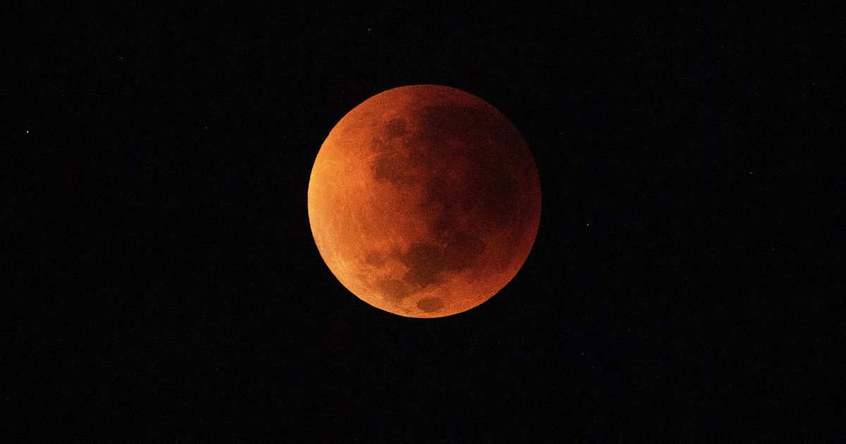 The blood moon is seen during a total lunar eclipse in Rio de Janeiro on May 16, 2022.