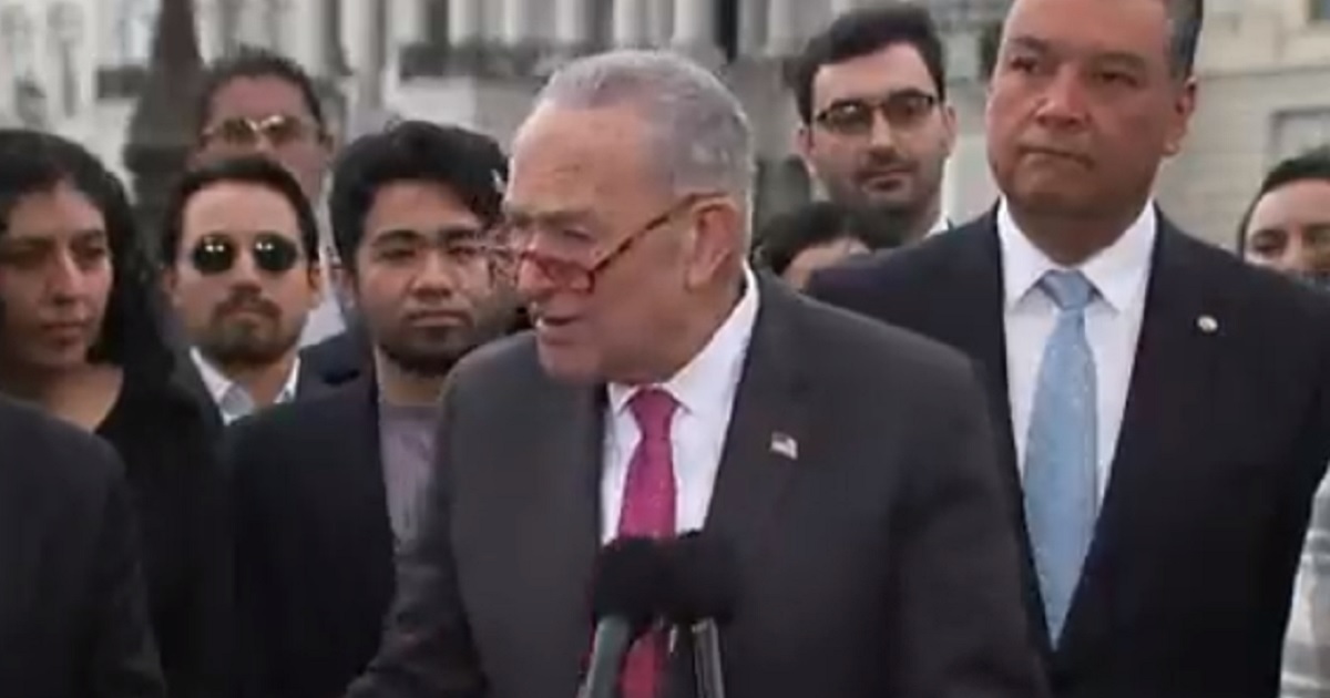 Senate Majority Leader Chuck Schumer addresses reporters outside the Capitol on Wednesday.