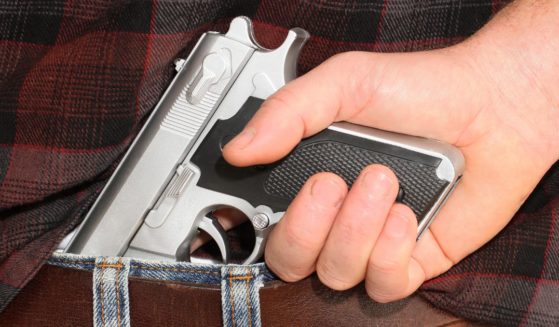 Pistol Concealed in a Man's Waistband