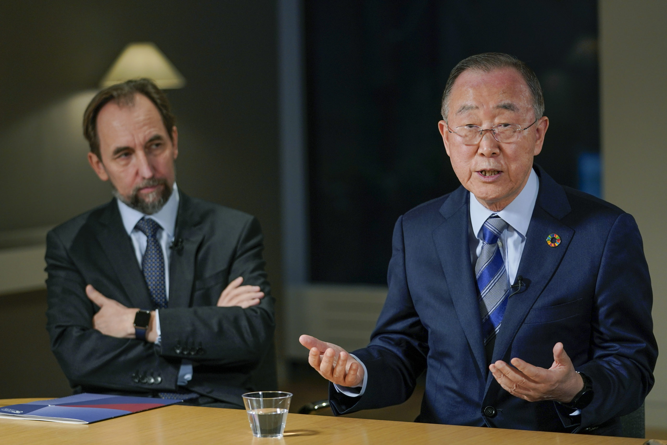 Former United Nations Secretary-General Ban Ki-moon, right, is joined by Zeid Raad Al Hussein, left, as he speaks during an interview with The Associated Press in New York City on Friday.