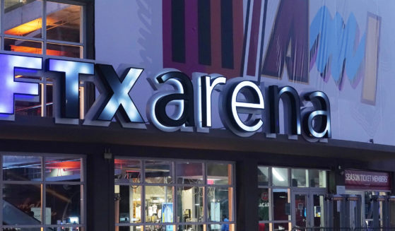Signage for the FTX Arena, where the Miami Heat basketball team plays, is illuminated in Miami, Florida, on Saturday.