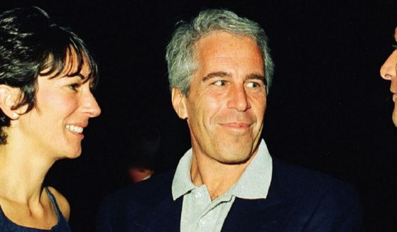 The late Jeffrey Epstein is pictured with his longtime girlfriend and confidant Ghislaine Maxwell in a 2000 file photo at the Mar-a-Lago Club in Palm Beach County, Florida.