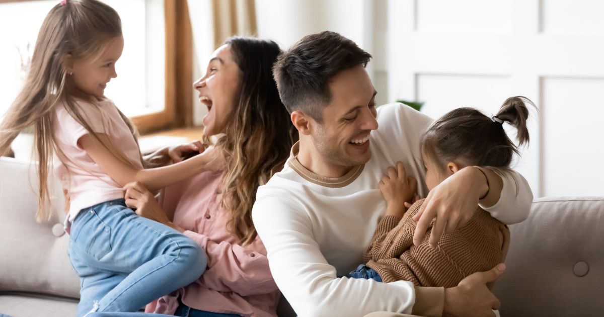 A family is seen in this stock image.