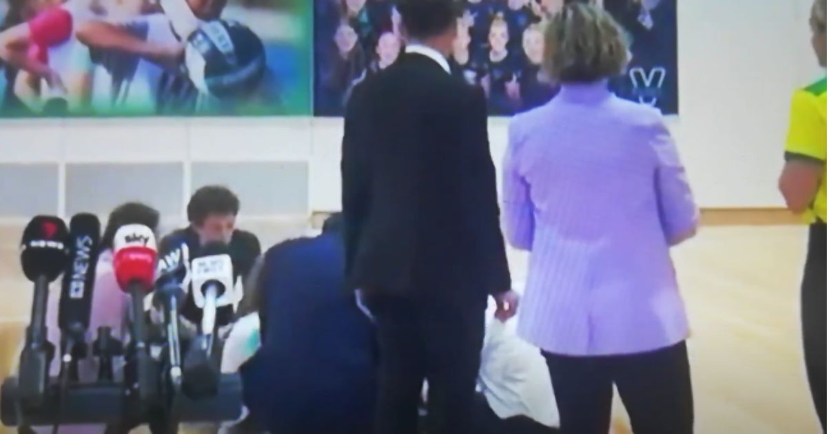 A child collapsed during a press conference.