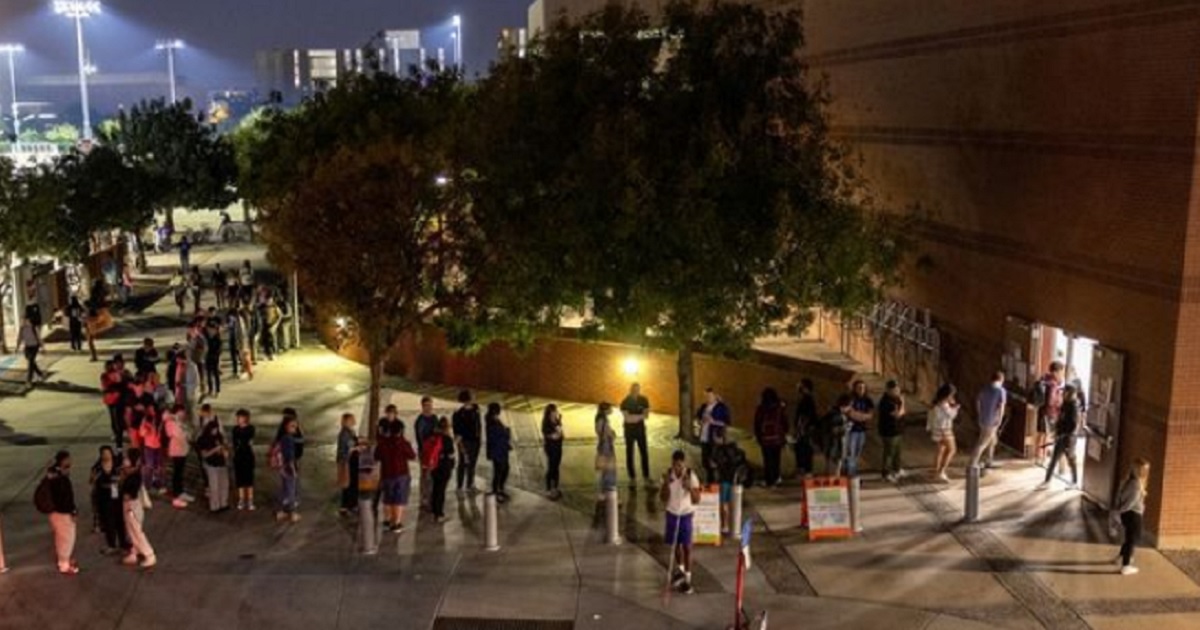 Students at Arizona State University wait in a long line on campus to vote in Tempe, Arizona, on Tuesday.