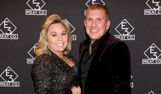 Julie Chrisley, left, and Todd Chrisley, right, attend the grand opening of E3 Chophouse Nashville on Nov. 20, 2019, in Nashville, Tennessee.