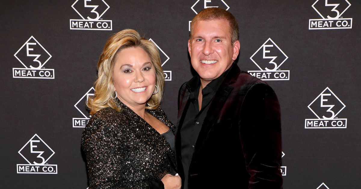 Julie Chrisley, left, and Todd Chrisley, right, attend the grand opening of E3 Chophouse Nashville on Nov. 20, 2019, in Nashville, Tennessee.