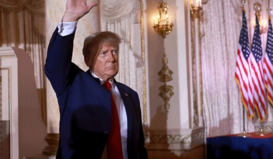 Former U.S. President Donald Trump waves after speaking during an event at his Mar-a-Lago home on Nov. 15 in Palm Beach, Florida.