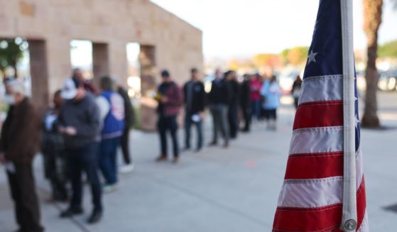 Voters wait in line to cast their ballots at Desert Breeze Community Center on Nov. 8 in Las Vegas.