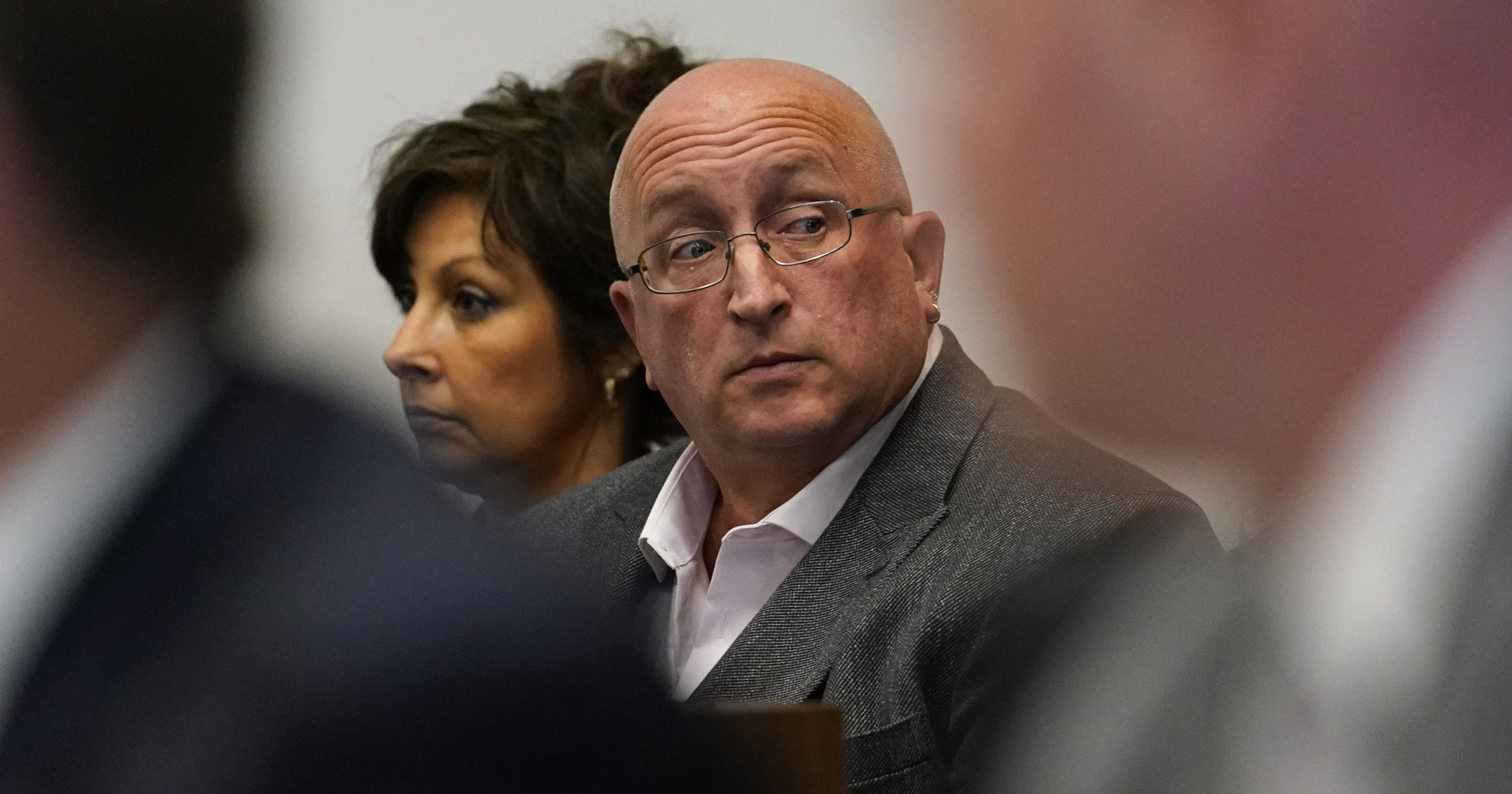 Robert E. Crimo III's father Robert Crimo Jr., right, and mother Denise Pesina attend to a hearing for their son in Lake County court on Aug. 3, 2022, in Waukegan, Illinois.