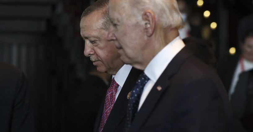 Turkish President Recep Tayyip Erdogan, left, walks with U.S. President Joe Biden, right, during the G20 leaders' summit in Bali, Indonesia, on Nov. 15.