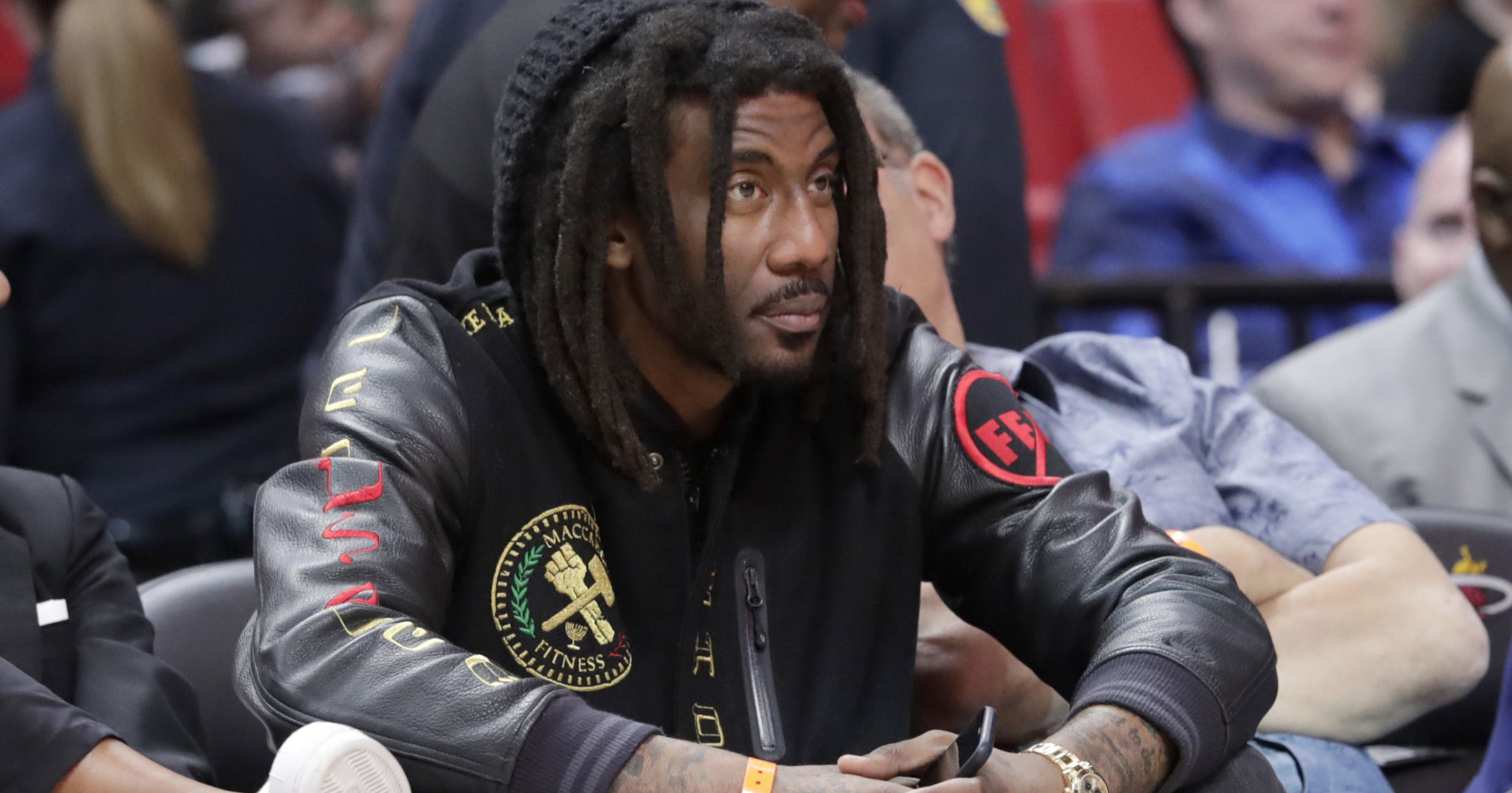 Former NBA star Amar'e Stoudemire watches a game between the Miami Heat and Sacramento Kings on Jan. 20, 2020, in Miami.