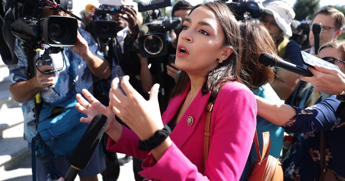 Rep. Alexandria Ocasio-Cortez (D-NY) talks to reporters before heading into the U.S. Capitol Building for final votes before a two-week state work period on Sept. 27, 2019, in Washington, D.C.