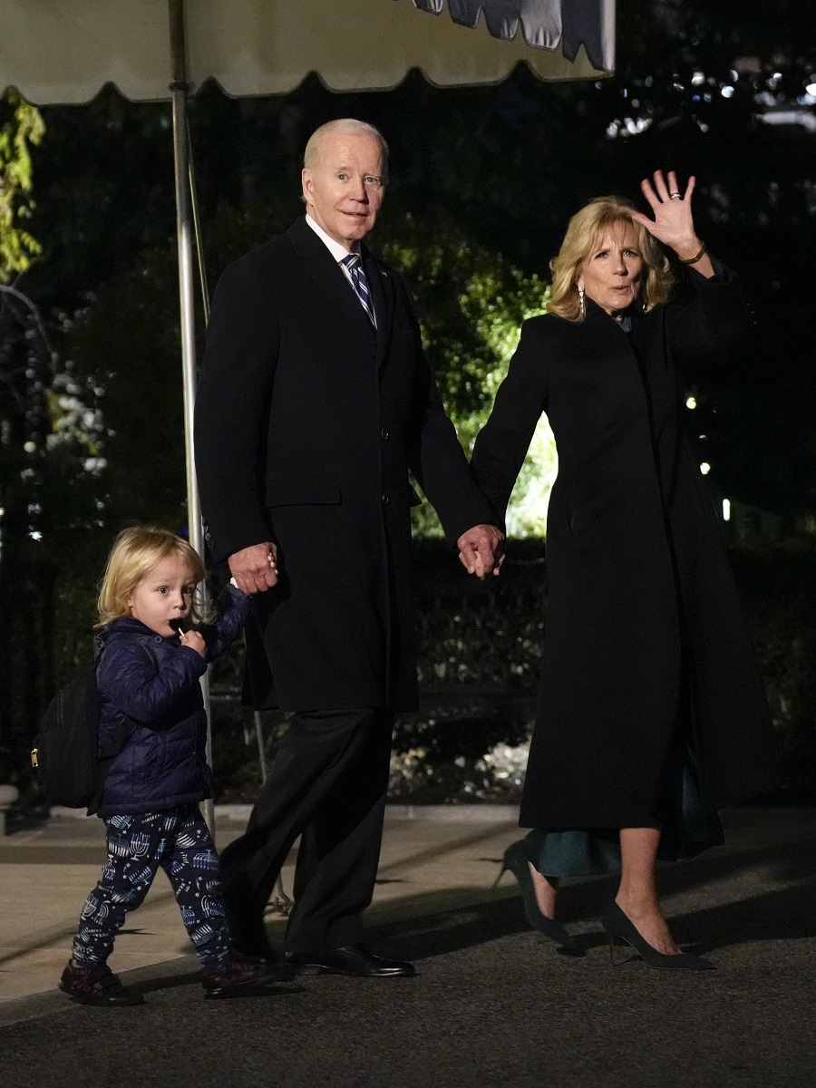 President Joe Biden walks with his grandson Beau Biden and first lady Jill Biden as they leave the White House and head to Marine One on the South Lawn in Washington on Friday.