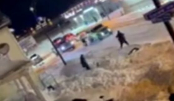A video uploaded to Twitter shows shop owners in Buffalo, New York, firing guns to protect their stores from looters in the city.