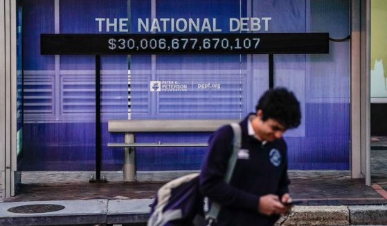 A Peterson Foundation billboard displaying the national debt is pictured on 18th Street in downtown Washington on Feb. 8.