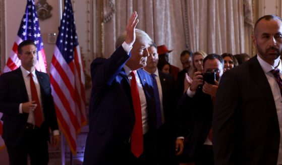 Former President Donald Trump waves after speaking at his Mar-a-Lago home on Nov. 15 in Palm Beach, Florida.