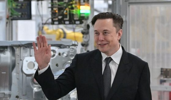 Tesla CEO Elon Musk waving