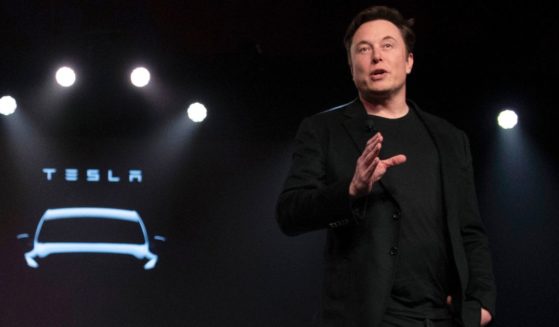 Tesla CEO Elon Musk speaks before unveiling the Model Y at the company's design studio in Hawthorne, California, on March 14, 2019.