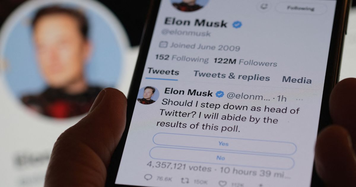 A cellphone displays Elon Musk's Twitter page on Sunday.