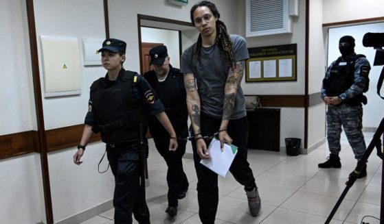 WNBA basketball player Brittney Griner, who was detained at Moscow's Sheremetyevo airport and later charged with illegal possession of cannabis, leaves the courtroom after the court's verdict in Khimki outside Moscow, on August 4, 2022.