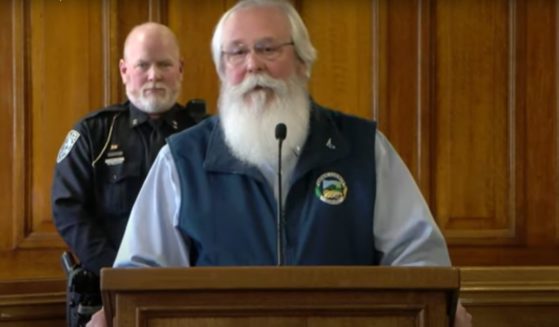 Latah County (Idaho), Prosecutor Bill Thompson, flanked by Police Chief James Fry, discusses the new development in the case.