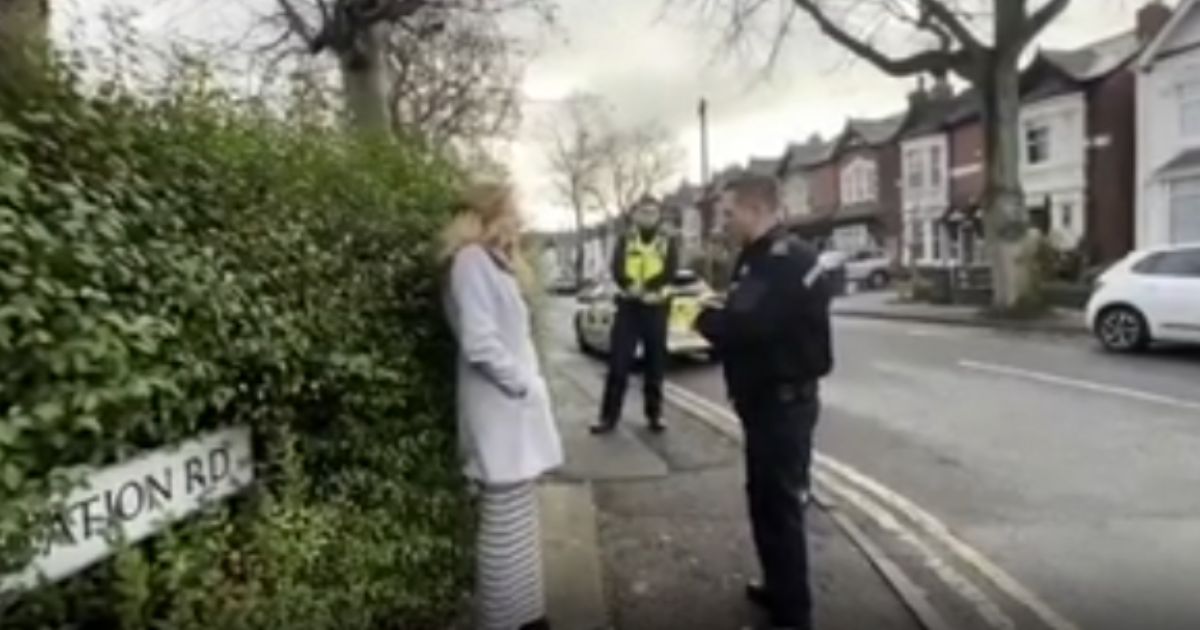 Isabel Vaughan-Spruce speaks with police before being arrested for praying near an abortion clinic in Birmingham, England. (Fox News / video scr