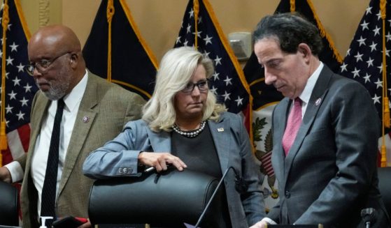 Rep. Bennie Thompson, left, Rep. Liz Cheney, center, and Rep. Jamie Raskin leave following a committee meeting on Capitol Hill on March 28 in Washington, D.C.