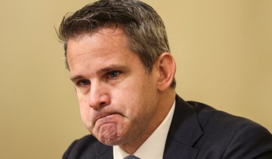 Rep. Adam Kinzinger cries as he speaks during a hearing by the House Select Committee investigating the Capitol incursion at the Cannon House Office Building in Washington, D.C., on July 27, 2021.