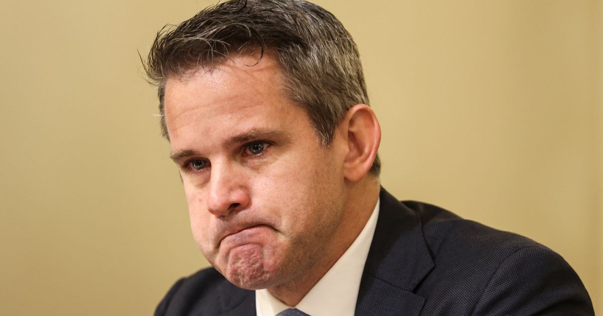 Rep. Adam Kinzinger cries as he speaks during a hearing by the House Select Committee investigating the Capitol incursion at the Cannon House Office Building in Washington, D.C., on July 27, 2021.