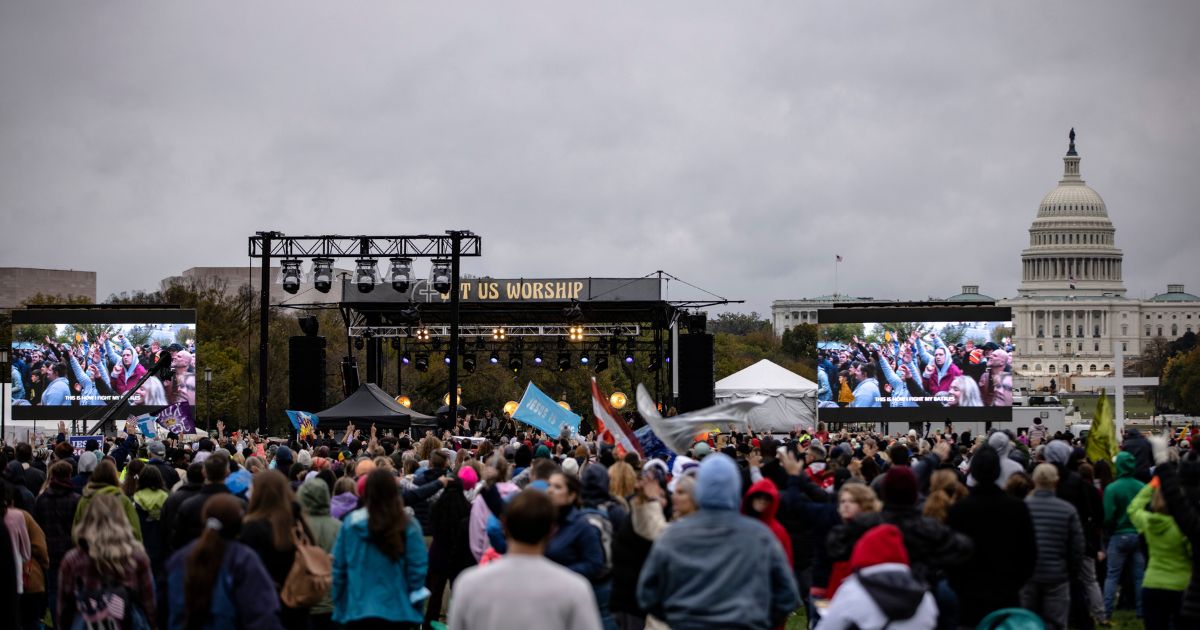 Worshippers attend a concert by evangelical musician Sean Feucht on the National Mall in Washinton, D.C., on Oct. 25, 2020.