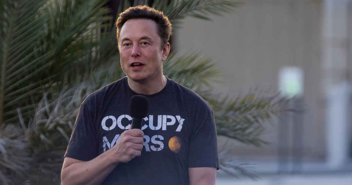 Elon Musk speaks during a T-Mobile and SpaceX joint event on August 25, 2022 in Boca Chica Beach, Texas.