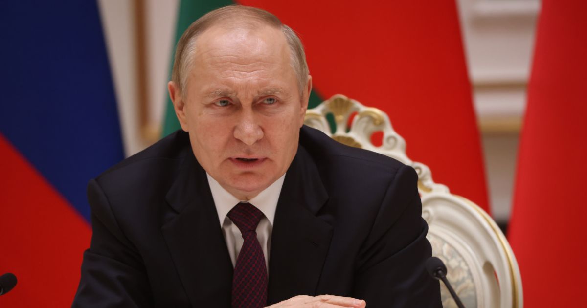 Russian President Vladimir Putin talks during his joint press conference with Belarussian counterpart at the Palace of Independence in Minsk, Belarus, on Sunday.