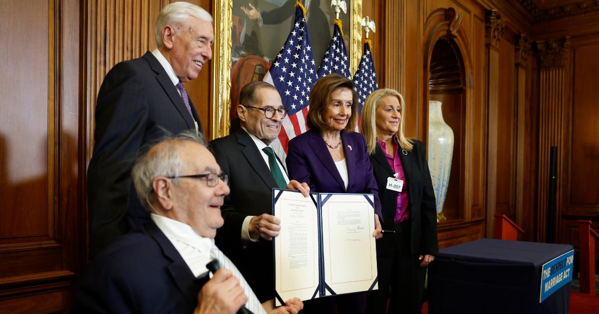 rmer Rep. Barney Frank (D-MA) poses for a photo with House Majority Leader Rep. Steny Hoyer (D-MD), Rep. Jerrold Nadler (D-NY), House Speaker Nancy Pelosi (D-CA) and Judith Kasen-Windsor, wife of Edith Windsor, following a bill enrollment ceremony for the Respect For Marriage Act on at the U.S. Capitol Building on December 8, 2022 in Washington, DC.