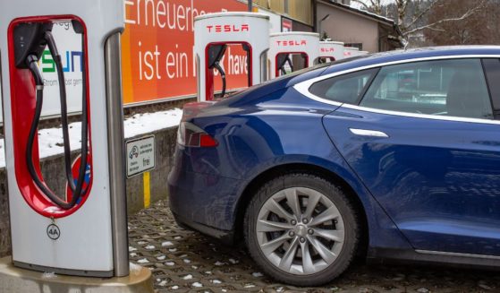A Tesla is charged at a station in Schaffhausen, Switzerland, on Jan. 7, 2021.