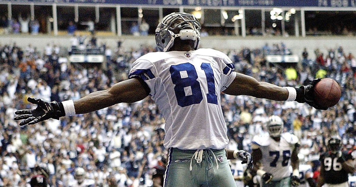On Oct. 15, 2006, then-Dallas Cowboys wide receiver Terrell Owens celebrates his third touchdown against the Houston Texans.