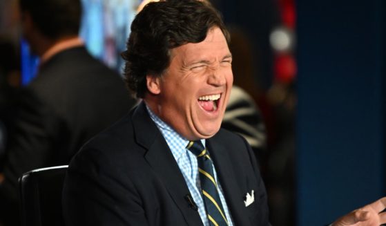 Fox News host Tucker Carlson laughs during the 2022 FOX Nation Patriot Awards at Hard Rock Live at Seminole Hard Rock Hotel & Casino Hollywood in Hollywood, Florida, on Nov. 17.