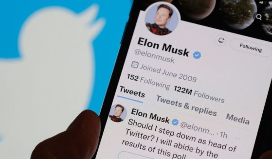A phone displays Elon Musk's Twitter page on Sunday in Los Angeles.