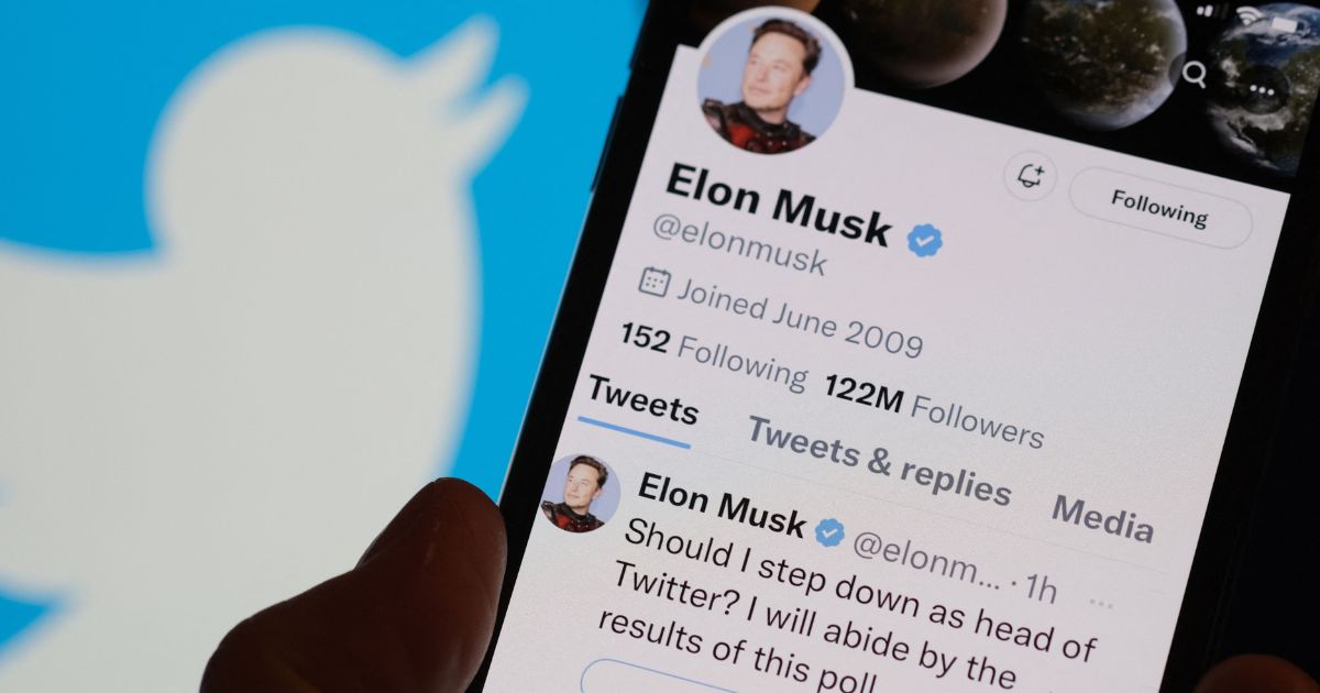 A phone displays Elon Musk's Twitter page on Sunday in Los Angeles.