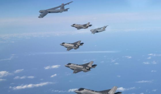 a U.S. B-52 bomber, C-17 and South Korean Air Force F-35 fighter jets flying over the Korean Peninsula during a joint air drill