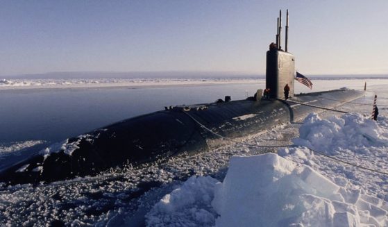 The USS Hampton is pictured at the North Pole in an undated file photo. A former military intelligence officer told Chris Lehto's YouTube audience about a strange incident he witnessed aboard the submarine.