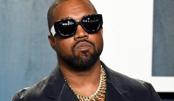 Kanye West, now known legally as "Ye," arrives at the Vanity Fair Oscar Party on Feb. 9, 2020, in Beverly Hills, California.