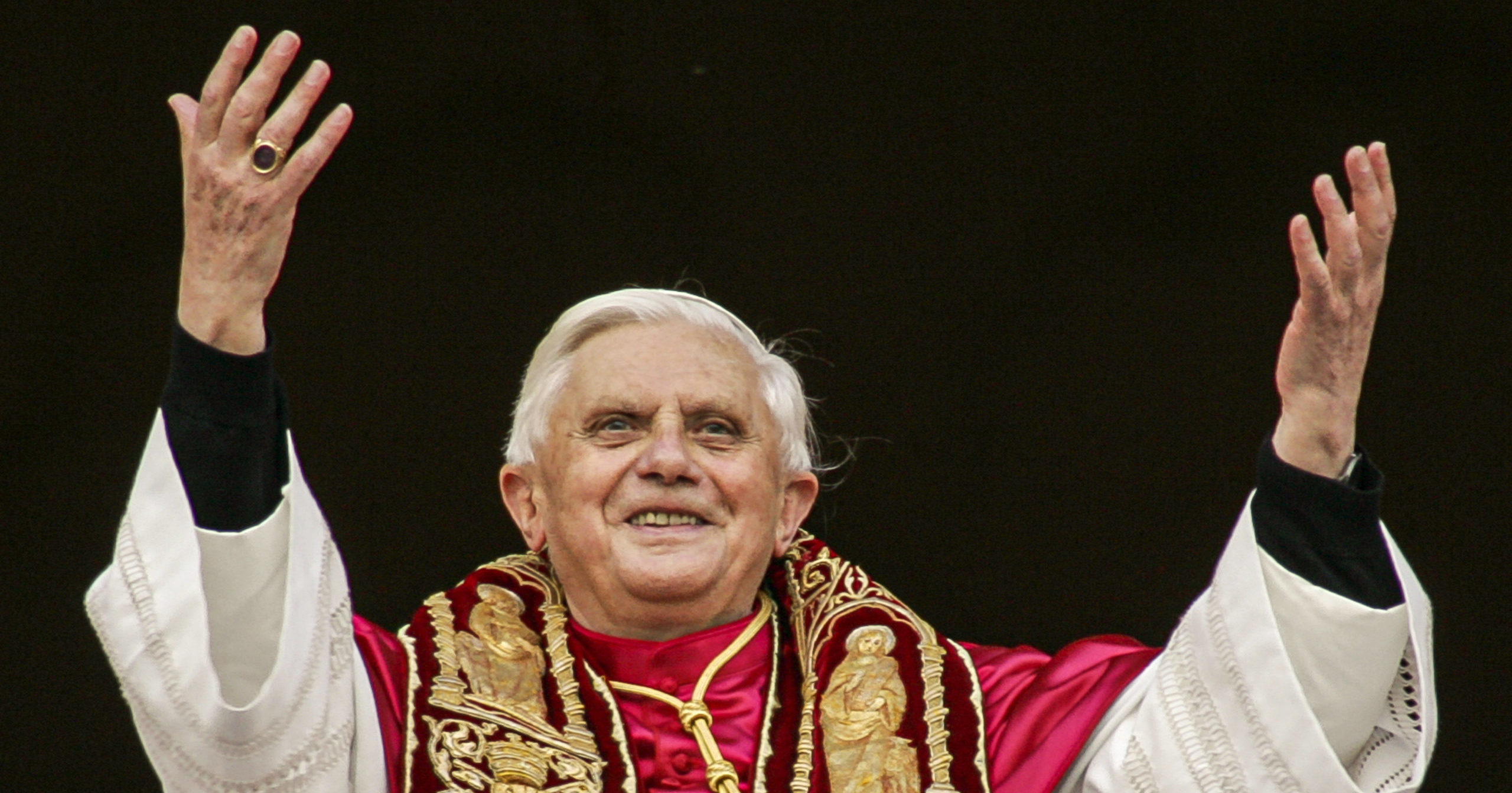 Pope Benedict XVI greets the crowd from the central balcony of St. Peter's Basilica at the Vatican on April 19, 2005, soon after his election.