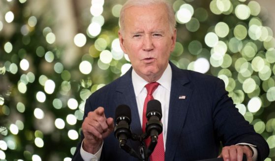 President Joe Biden delivers a Christmas address from the Cross Hall of the White House in Washington, D.C, on Thursday.
