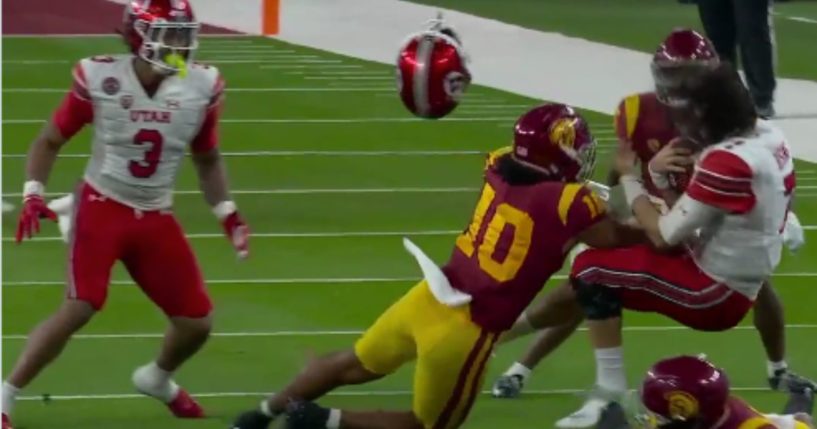 USC linebacker Ralen Goforth laid a big hit on Utah quarterback Cameron Rising in the Pac-12 championship game on Friday.