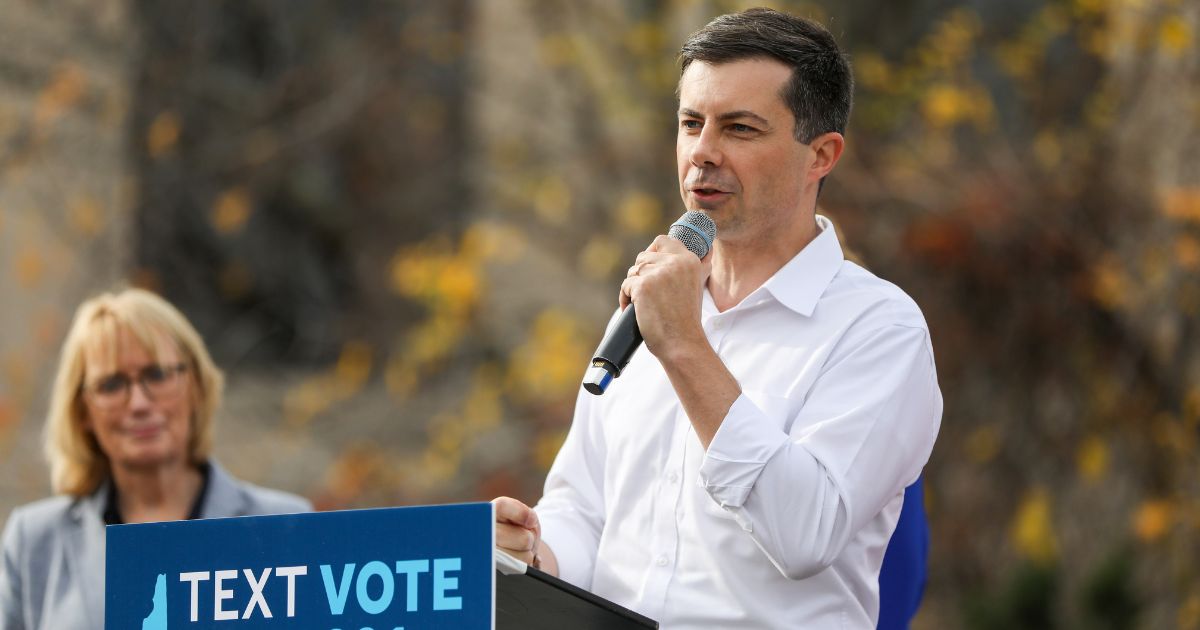 U.S. Transportation Secretary Pete Buttigieg, campaigns for U.S. Sen. Maggie Hassan (D-NH) during a campaign event on Nov. 6 in Nashua, New Hampshire.