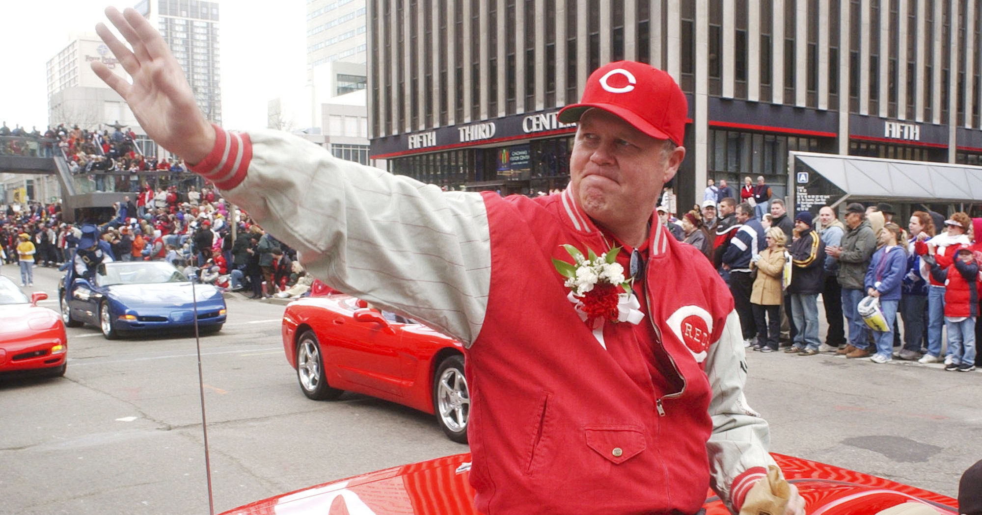 Former Cincinnati Reds pitcher Tom Browning waves during the Findlay Market Parade through downtown Cincinnati on March 31, 2003.